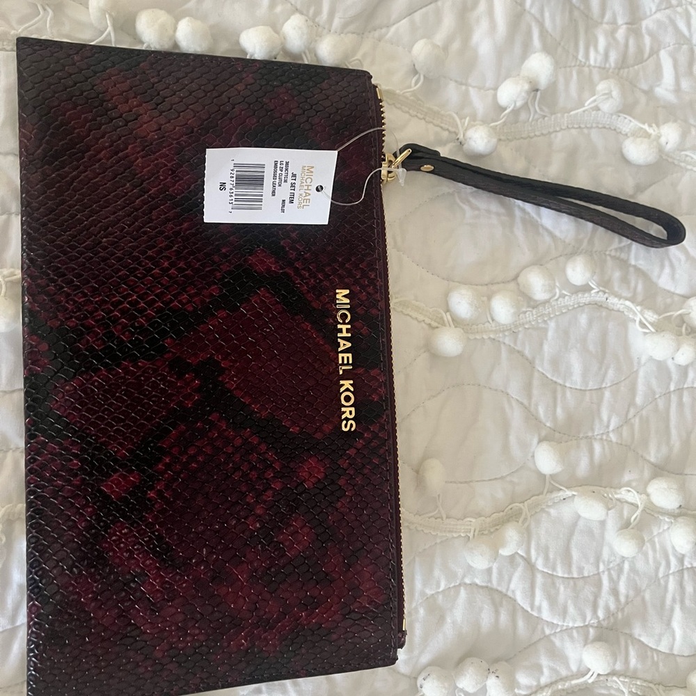 Snake embossed burgundy brand new clutch